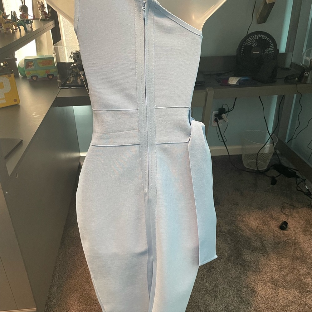 Baby blue bandage dress with waistline cutout.